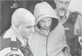  ??  ?? Nicholas Butcher, centre, at an earlier court appearance in Halifax.