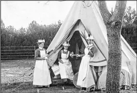  ?? SUBMITTED PHOTO ?? Georgina Pope, centre, serves tea at a camp in South Africa during the Boer War.