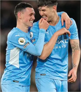  ?? GETTY IMAGES ?? Tour trouble: Foden (left) and Stones will not travel