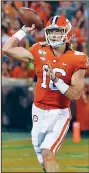  ?? AP File Photo ?? Clemson quarterbac­k Trevor Lawrence delivers a pass against Georgia Tech on Thursday in Clemson, S.C.