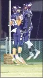  ?? NWA Democrat-Gazette/CHARLIE KAIJO ?? Elkins wide receiver Layne Evans (30) and teammate Chad Graham celebrate Friday after a touchdown in Elkins.