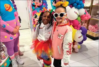  ?? ANNE D’INNOCENZIO/ASSOCIATED PRESS ?? Taylen Biggs, right, and Nubia Williams pose at an FAO Schwarz store where toy company Cepia LLC launched its new fashion doll line called Decora Girlz on March 2, 2024in New York. Cepia, which is based in St. Louis, Missouri, began investing in Tiktok in 2019.