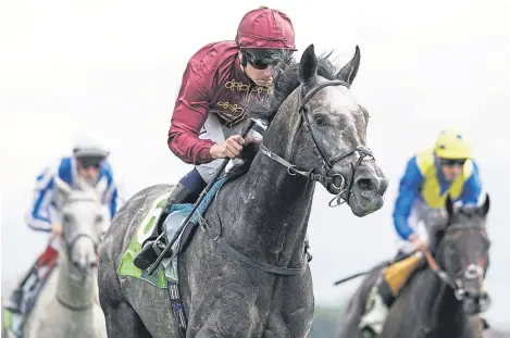  ?? Picture: Getty Images. ?? Oisin Murphy eases Roaring Lion down after winning the Juddmonte Internatio­nal.