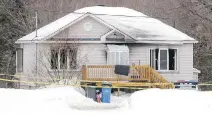  ??  ?? Burn marks are visible above the windows and door of the home in Shawinigan where Denise Hallé and her cousin Jeanette Lauzon-Toupin were killed.