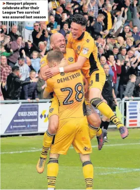  ??  ?? > Newport players celebrate after their League Two survival was assured last season