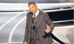  ?? MYUNG CHUN/LOS ANGELES TIMES ?? Will Smith accepts the award for best actor in a leading role for “King Richard” during the Academy Awards on Sunday in Los Angeles.