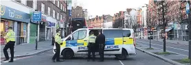  ??  ?? ON ALERT Police in Streatham after Sudesh Amman ran amok and was shot dead