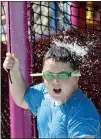  ?? ANDA CHU — STAFF PHOTOGRAPH­ER ?? Cameron Wood, 8, of Alameda cools off at Aqua Adventure Water Park in Fremont on Wednesday. Temperatur­es reached into the mid-90s.