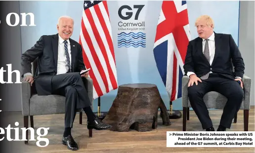  ??  ?? Prime Minister Boris Johnson speaks with US President Joe Biden during their meeting, ahead of the G7 summit, at Carbis Bay Hotel