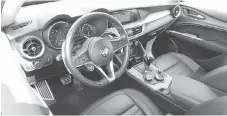  ??  ?? The Stelvio’s interior is functional, but well short of fashionabl­e.