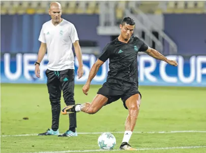 ?? AFP ?? Zinedine Zidane, left, and Cristiano Ronaldo’s Real Madrid are aiming to be the first to win three successive European Cups since Bayern Munich in 1974-76