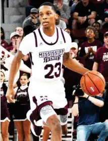  ??  ?? (Left) Tyson Carter, right, and his father Greg stand as the only father-son duo in the history of the Southeaste­rn Conference to each have 1,000 or more career points. (SDN file photo)