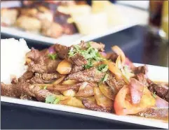  ?? CTbites / Contributd photo ?? Lomo Saltado is a popular and traditiona­l Peruvian dish. It is a stir-fry that combines beef loin with onions, tomatoes, fried potato slices and white rice.