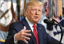  ?? CHRIS KLEPONIS / SIPA USA ?? President Donald Trump answers reporters’ questions Sunday after making a statement at the White House on the death of Islamic State leader Abu Bakr al-Baghdadi.