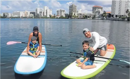  ??  ?? Nicky enjoying the idyllic setting of Puerto Rico with his wife Michelle and sons, Matteo and Luca.