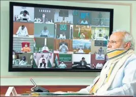  ?? ANI PHOTO ?? ■
Prime Minister Narendra Modi interacts with chief ministers of different states through video conferenci­ng on Monday.