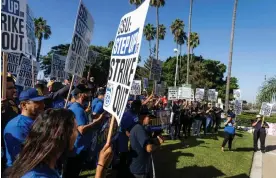  ?? California. Photograph: Paul Bersebach/AP ?? Students and union members protest the tuition increase outside the CSU chancellor's office on 12 September 2023 in Long Beach,