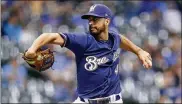  ?? DYLAN BUELL / GETTY IMAGES ?? Brewers left-hander Gio Gonzalez allowed two hits — both singles — in six innings while striking out five and walking two in a 7-0 win against the Reds on Wednesday in Milwaukee.