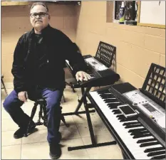  ?? PHOTO BY CESAR NEYOY/BAJO EL SOL ?? NORIEGA AT THE KEYBOARD he has used to teach piano to students in San Luis, Ariz.