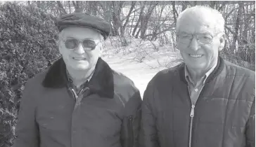  ?? File Photo ?? The McKee twins, Russell, left, and Gerald, in a photo for The Observer in 2001 shortly before their last-ever maple taffy display, having begun at the very first festival in 1965.