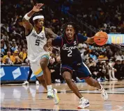  ?? Patrick McDermott/Getty Images ?? UConn’s Tristen Newton (2) earned Associated Press Big East men’s basketball Player of the Year honors.