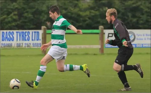  ??  ?? Ricky Dwyer of Shamrock Rovers is chased by Matt Kavanagh of Gorey Celtic during their Premier Division match on Sunday.