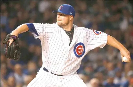  ??  ?? Cubs starting pitcher Jon Lester allowed two runs and six hits in six innings Wednesday night against the New York Mets at Wrigley Field. | CHARLES REX ARBOGAST/ AP