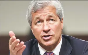  ?? AP PHOTO/J. SCOTT APPLEWHITE ?? In this June 13, 2012, file photo, JPMorgan Chase CEO Jamie Dimon testifies before the Senate Banking Committee on Capitol Hill in Washington. During calls with reporters and Wall Street analysts on Friday, Dimon vented his irritation with politician­s...