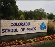  ?? BRENNAN LINSLEY — THE ASSOCIATED PRESS ?? In this Oct. 2, 2015photo, a student walks past the entrance to the Colorado School of Mines, a public research university devoted to engineerin­g and applied science, in Golden, Colo.