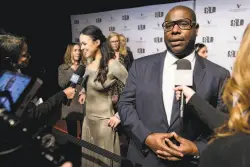  ?? Michael Short / Special to The Chronicle ?? Top: Amy Adams is interviewe­d at the SFFilm Awards Night, where she received the acting prize. Above: Steve McQueen, awardee for directing, with Michelle Rodriguez, who stars in his film “Widows.”