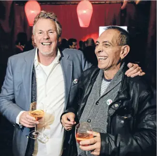  ?? Photo: KEVIN STENT/FAIRFAX NZ ?? John Coleman, left, and Giuseppe Malaponti, who is very ill with liver cancer, share a laugh at The Atrium during a fundraiser and tribute to the hospitalit­y legend.