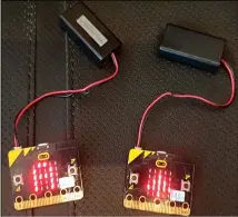  ??  ?? Paired with battery packs, these micro:bit walkie-talkies are completely wireless, and actually have a decent range.