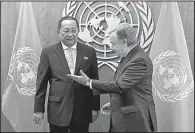  ?? AP/CRAIG RUTTLE ?? North Korean Foreign Minister Ri Yong Ho (left) talks with U.N. Secretary-General Antonio Guterres before a meeting Saturday in New York. In an address, Ri said his country’s military goal is “to establish the balance of power with the U.S.”