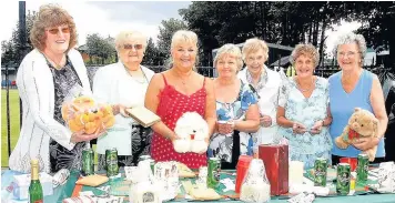  ??  ?? Members of the Rochdale Ladies Auxiliary with some of the raffle prizes at their garden party