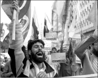  ?? ASIF HASSAN / AFP ?? Sunni Muslims demonstrat­e in Karachi, Pakistan, on Thursday against Iran and in support of Saudi Arabia.