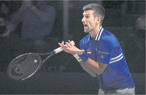  ?? AFP ?? World No.1 Novak Djokovic of Serbia reacts during a match last month.