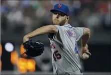  ?? MATT ROURKE — THE ASSOCIATED PRESS ?? Starting pitcher Zack Wheeler, the ex-Met who was the Phillies’ biggest free agent prize last winter, continues to question the safety of his return to the game amid the coronaviru­s pandemic, due to his wife’s late-stage pregnancy.