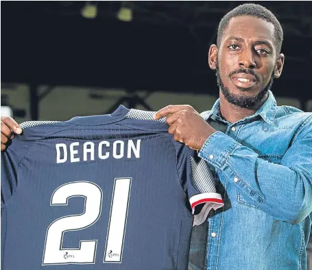  ?? Picture: SNS Group. ?? Roarie Deacon shows off his new colours after being unveiled as Dundee’s latest signing.