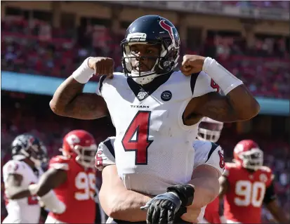  ?? ED ZURGA — THE ASSOCIATED PRESS ?? Texans quarterbac­k Deshaun Watson celebrates his touchdown against the Chiefs in Kansas City in October of 2019.