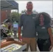  ?? SUBMITTED PHOTO ?? Matt Guagliardo of Italian People’s Bakery provided a cake to Trenton Free Public Library manager, Patricia Hall. TFPL celebrated a 116th anniversar­y last Friday.