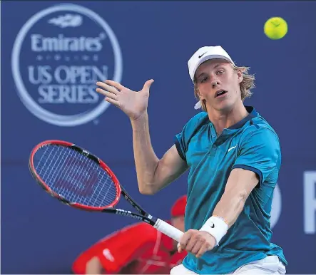  ?? VAUGHN RIDLEY/GETTY IMAGES ?? Canadian teenager Denis Shapovalov plays a shot against Nick Kyrgios of Australia during Monday action at the Rogers Cup in Toronto. Shapovalov, a wild-card entry, shocked the No. 11-seeded Kyrgios 7-6(2), 3-6 and 6-3.