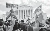  ?? Mandel Ngan AFP/Getty Images ?? A CROWD demonstrat­es outside the U.S. Supreme Court building in Washington on Tuesday.