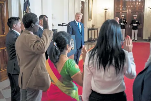  ?? Doug Mills, NYTNS ?? President Donald Trump participat­es in a naturaliza­tion ceremony at the White House in Washington, during the Republican National Convention, on Tuesday. “This didn’t honor them. It reduced them to reelection props,” Frank Bruni writes.