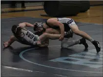  ?? KEVIN LOZON — FOR MEDIANEWS GROUP ?? Brady St. John, right, of Richmond wrestles at 160pounds in the title match of a Division 3regional at Richmond on Wednesday.