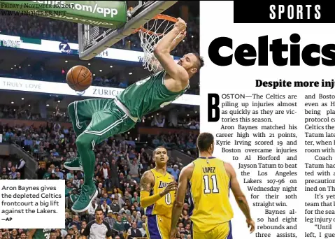  ?? —AP ?? Aron Baynes gives the depleted Celtics frontcourt a big lift against the Lakers.