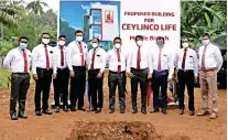  ?? ?? Ceylinco Life management representa­tives and branch staff at foundation stone laying ceremony