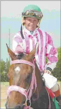  ?? COADY PHOTOGRAPH­Y ?? Jockey Tracy Hebert enters racing on Sunday with 3,992 wins.