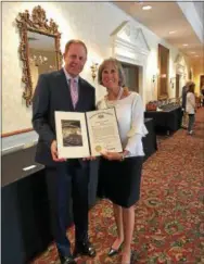  ?? SUBMITTED PHOTO ?? State Rep. Duane Milne, R-167, presented 2018 Kitchen Table Award winner Susan Elko with a House citation in honor of her deep commitment and service to Chester County.