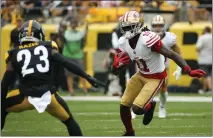  ?? JUSTIN K. ALLER — GETTY IMAGES ?? The 49ers’ Brandon Aiyuk runs up the field against Pittsburgh’s Damontae Kazee in the first half on Sunday in Pittsburgh.