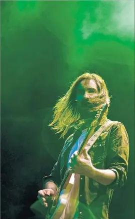  ?? Patricia De Melo Moreira AFP/Getty Images ?? KEVIN PARKER is f lexing his musical muscles outside of his Tame Impala role.